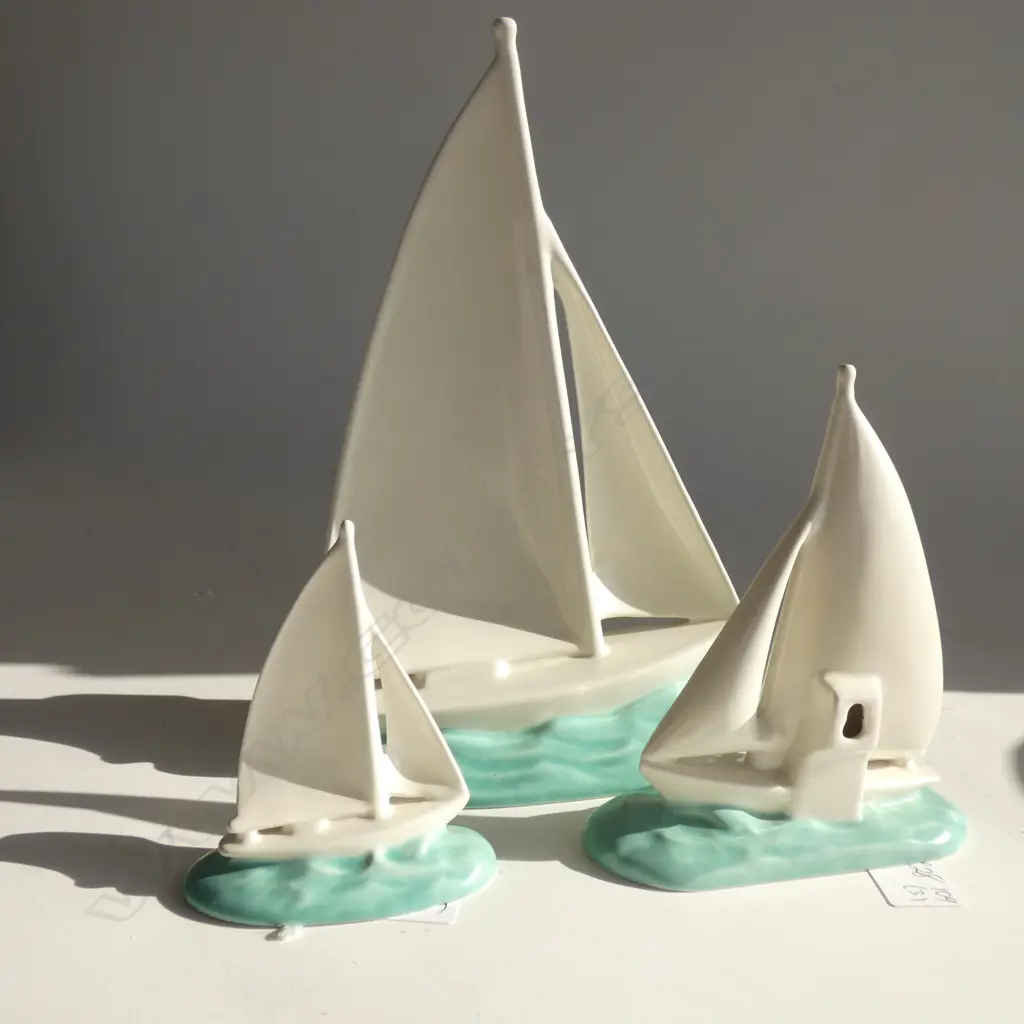 A graduated set of three Poole yachts Image 1++